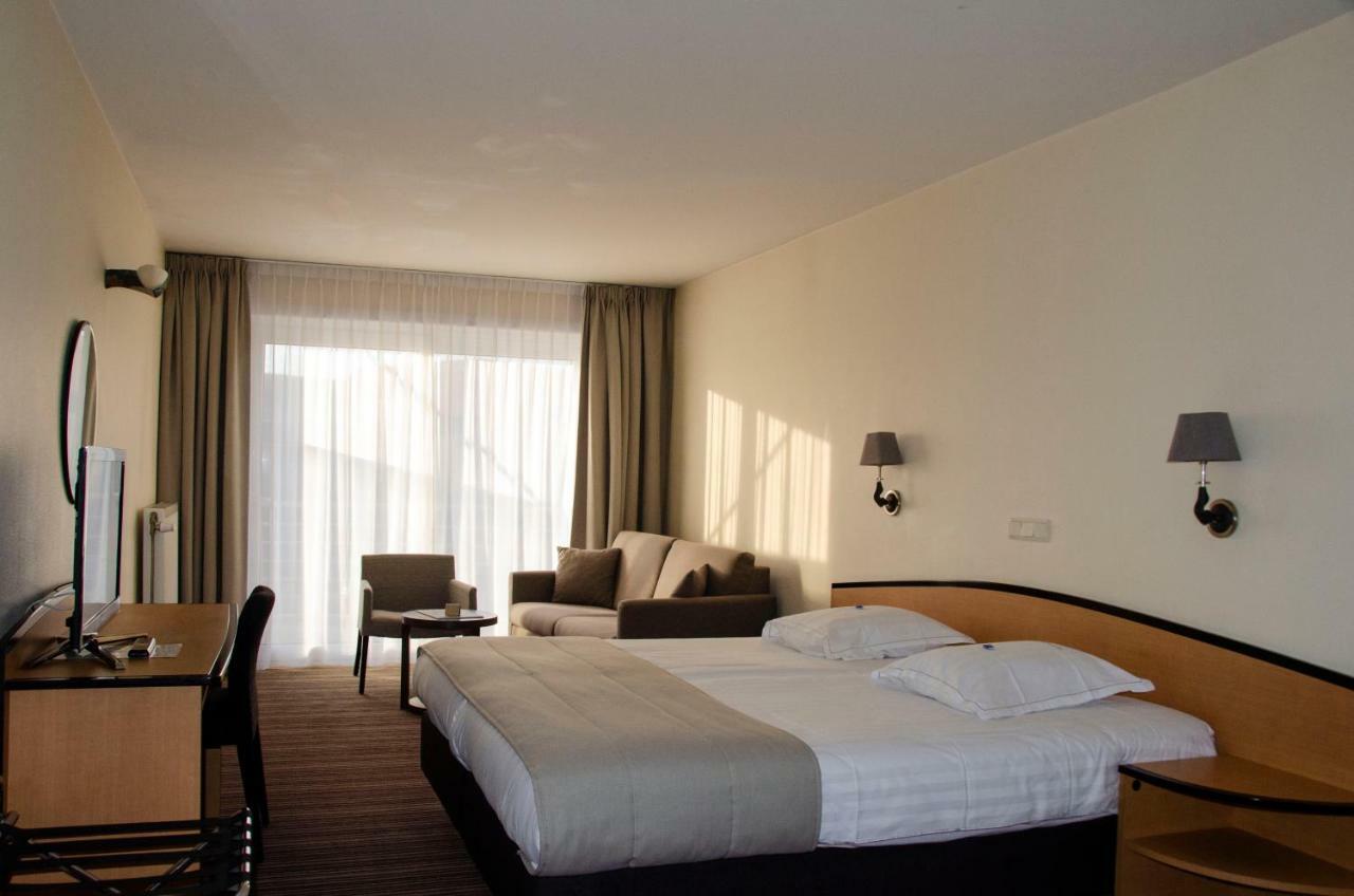Hotel Arcato De Haan Bagian luar foto