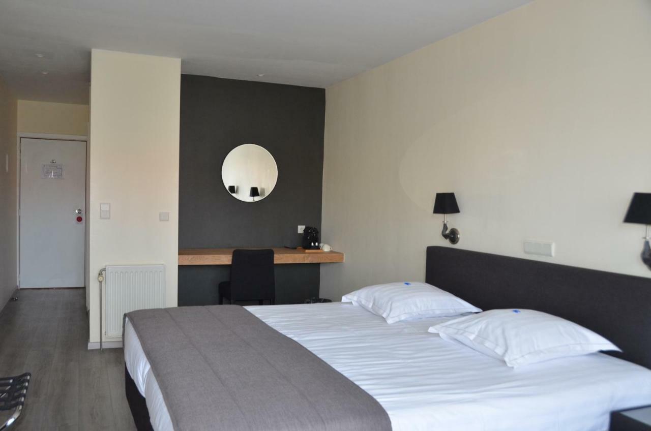 Hotel Arcato De Haan Bagian luar foto