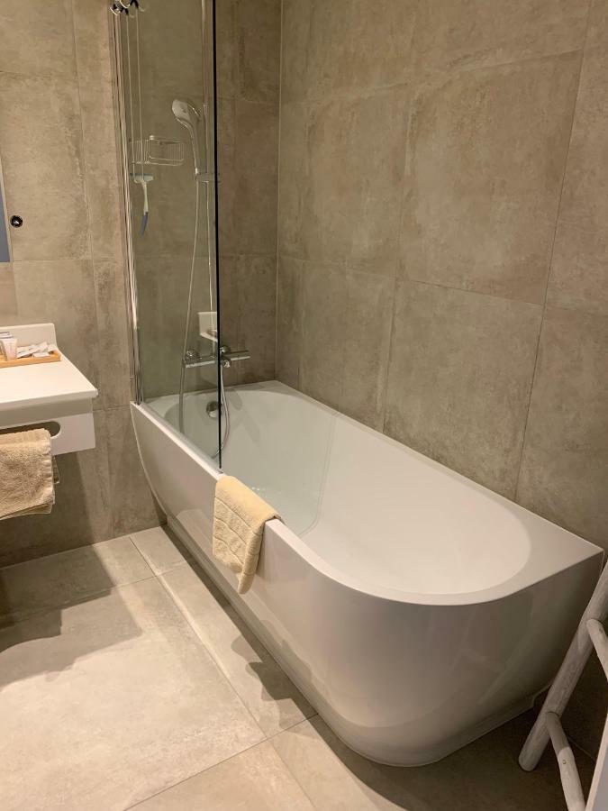 Hotel Arcato De Haan Bagian luar foto