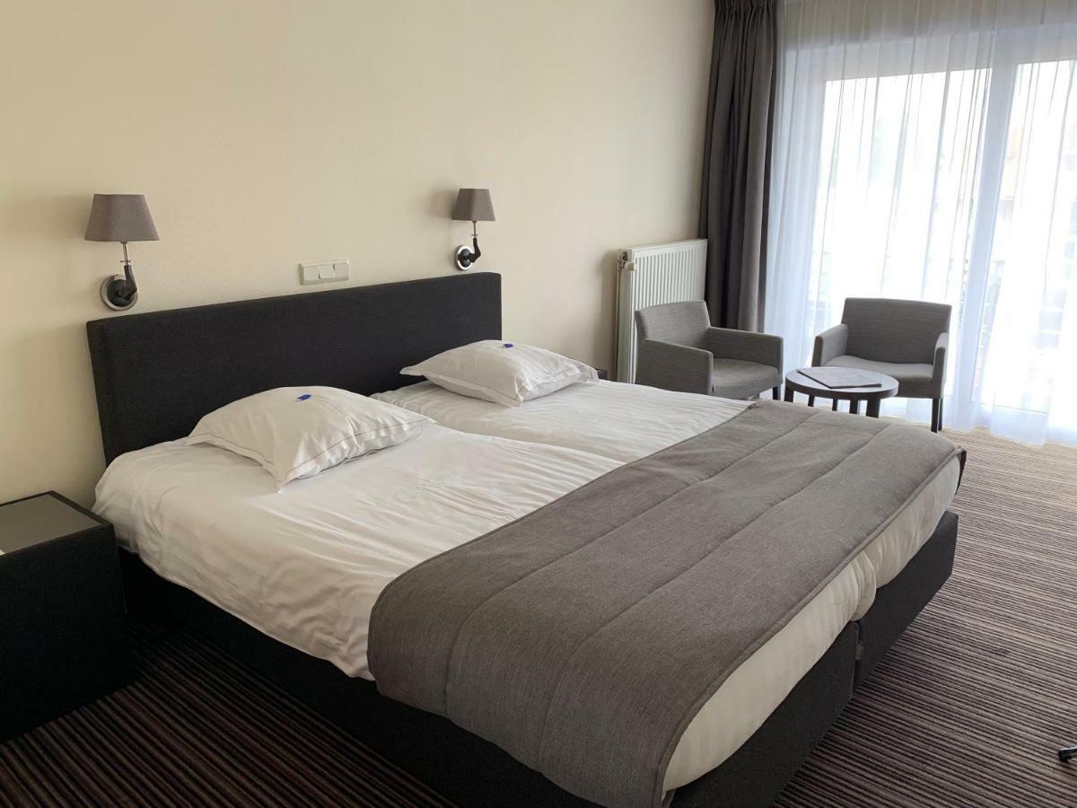 Hotel Arcato De Haan Bagian luar foto